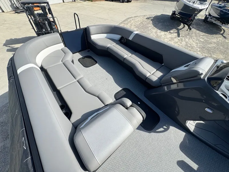 Slide: The Image of Interior of Evotti 525QL boat, 2026 model, featuring gray upholstery. - 10