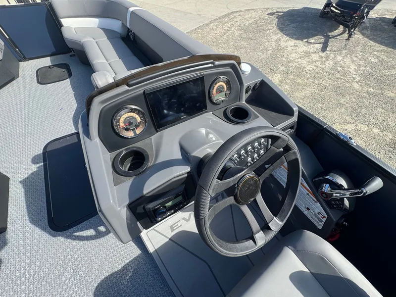 Slide: The Image of Interior of Evotti 525QL boat, 2026 model, featuring modern helm. - 12