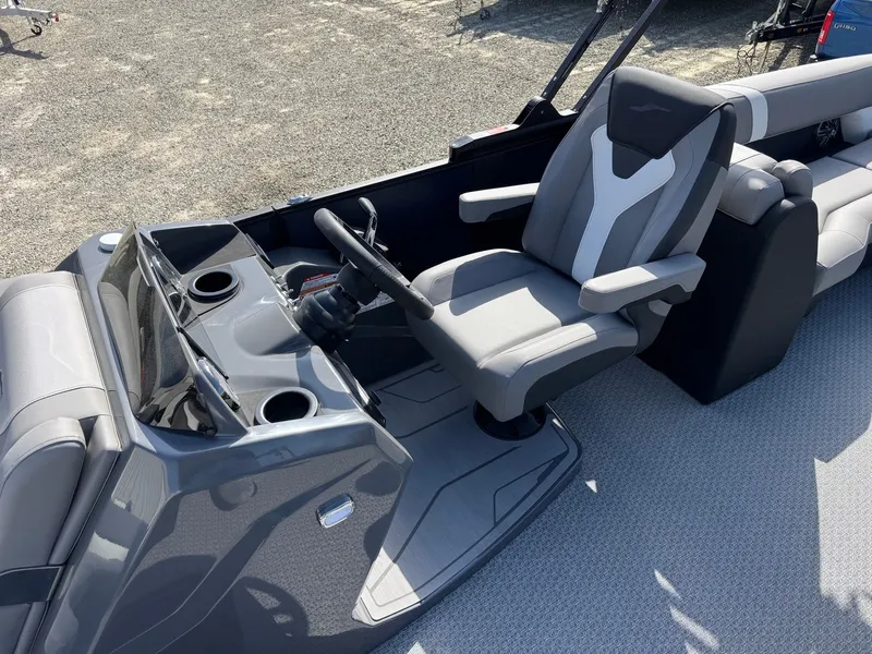 Slide: The Image of Interior of 2026 Evotti 525QL boat featuring modern helm station. - 5