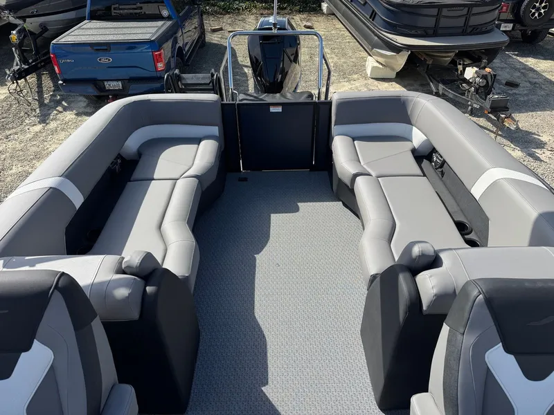 Slide: The Image of Interior of Evotti 525QL boat, 2026 model, featuring gray upholstered seating. - 6