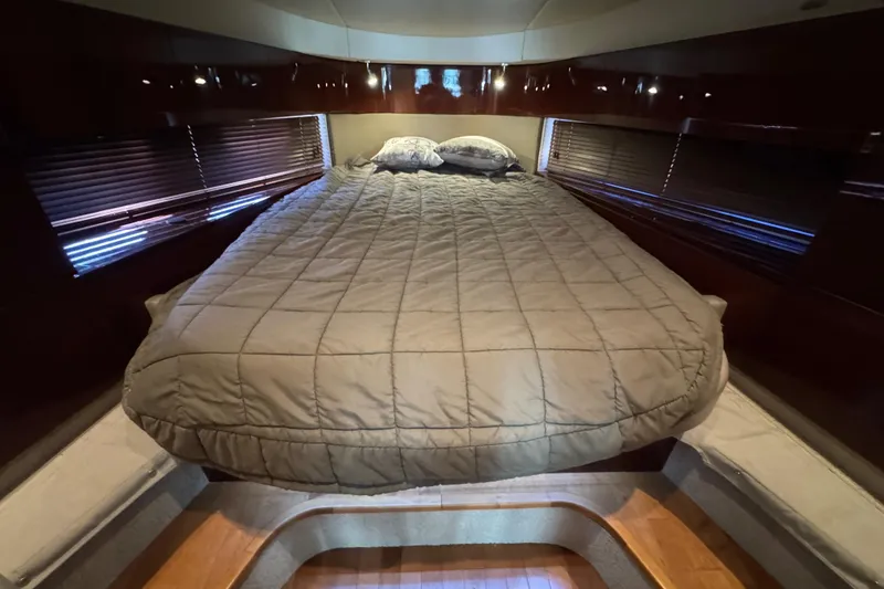 Slide: The Image of 2010 Sea Ray 470 Sundancer yacht kitchen with grill, sink, and countertop. - 14