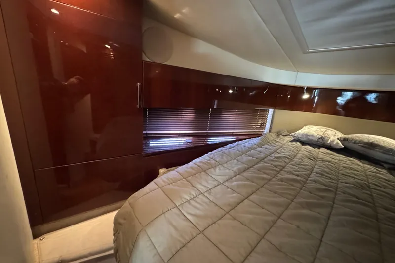 Slide: The Image of Interior of 2010 Sea Ray 470 Sundancer yacht with sleek kitchenette and modern amenities. - 15