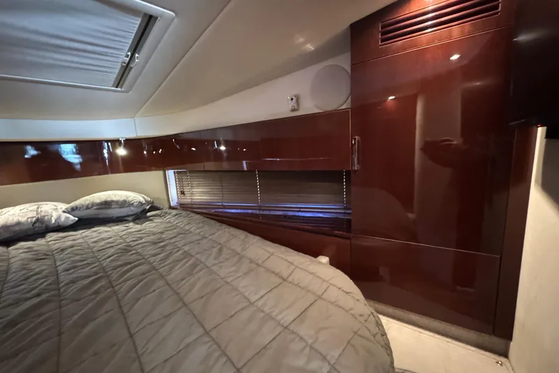 Slide: The Image of Luxurious kitchen interior of 2010 Sea Ray 470 Sundancer yacht with wood cabinetry. - 16