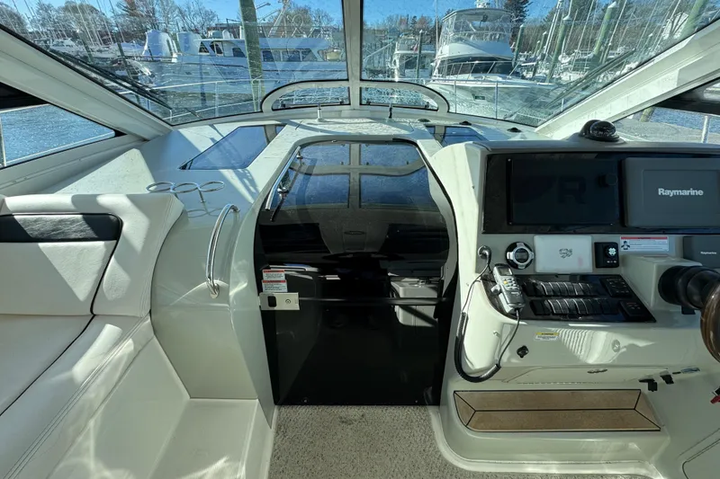 Slide: The Image of Luxurious kitchen interior of 2010 Sea Ray 470 Sundancer yacht with sleek cabinetry. - 19