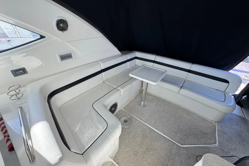 Slide: The Image of Control panel of a 2010 Sea Ray 470 Sundancer boat with chrome throttle levers. - 31