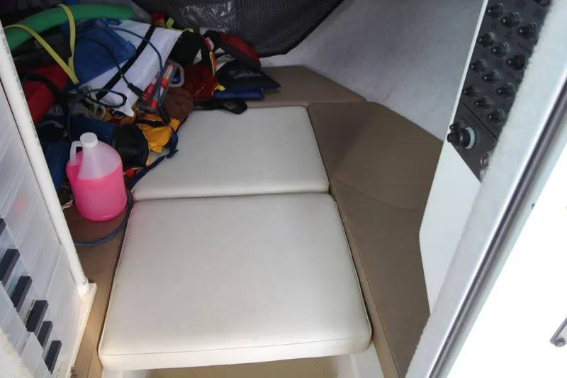 Slide: The Image of 2017 Parker 2820 XLD Sport Cabin interior with cushions and storage items. - 19