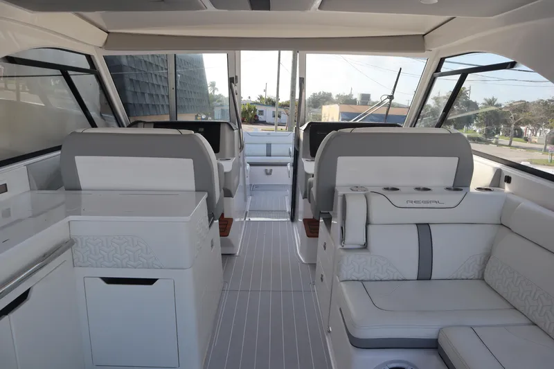 Slide: The Image of 2022 Regal LX36 luxury boat interior with modern seating and sleek design. - 34