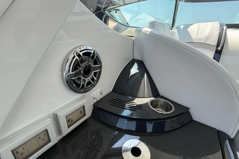 Slide: The Image of 2022 Formula 40 Performance Cruiser interior with speaker, cup holder, and power outlets. - 11