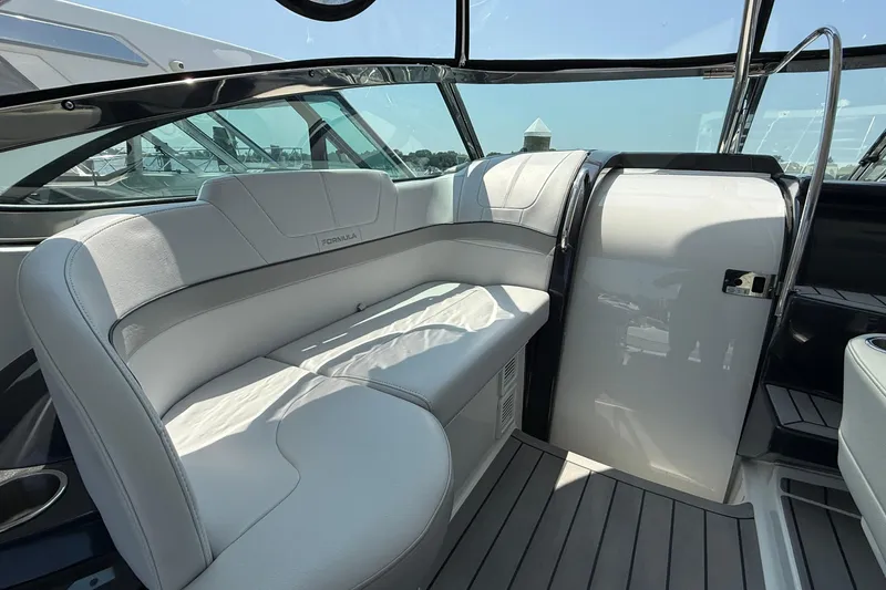 Slide: The Image of 2022 Formula 40 Performance Cruiser interior with sleek seating and modern design. - 12