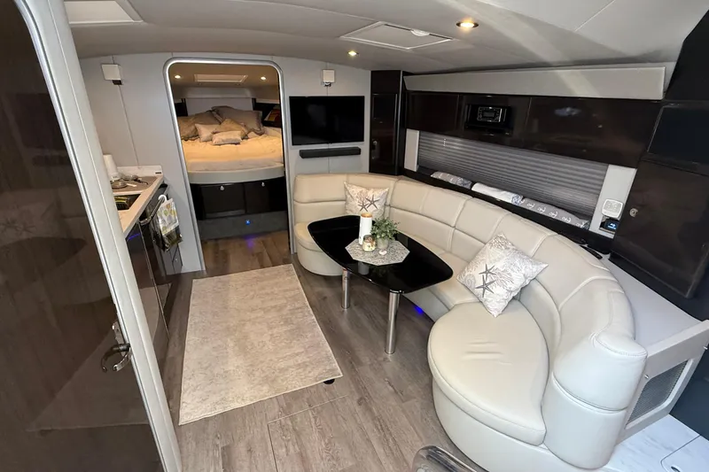 Slide: The Image of Luxurious interior of 2022 Formula 40 Performance Cruiser with modern seating and cozy bedroom. - 13