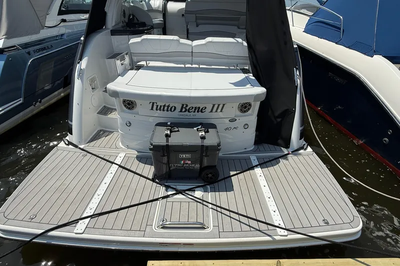 Slide: The Image of 2022 Formula 40 Performance Cruiser docked, featuring spacious deck and YETI cooler. - 20