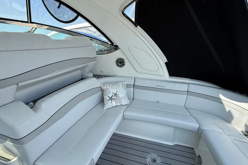 Slide: The Image of Luxurious interior of 2022 Formula 40 Performance Cruiser with elegant seating and starfish pillow. - 7