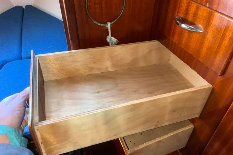 Slide: The Image of Wooden drawer in a 1975 Contest 36 boat interior, showcasing craftsmanship and storage space. - 25