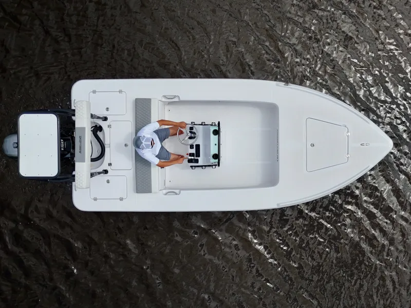 Slide: The Image of Overhead view of 2025 Action Craft 17 Flats boat on water. - 18