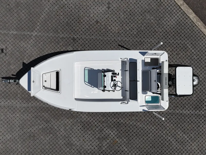 Slide: The Image of Overhead view of 2025 Action Craft 17 Flats boat on a paved surface. - 40