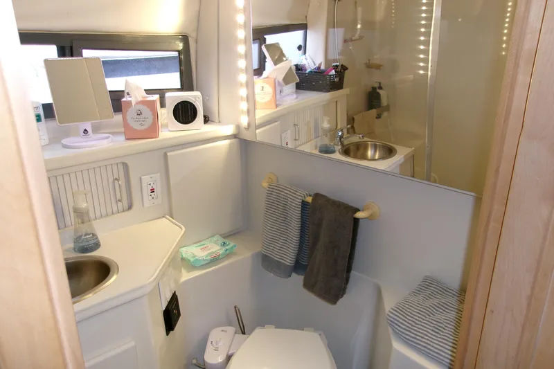 Slide: The Image of Bathroom interior of 1995 Carver 355 Aft Cabin Motor Yacht, featuring sink and shower. - 21