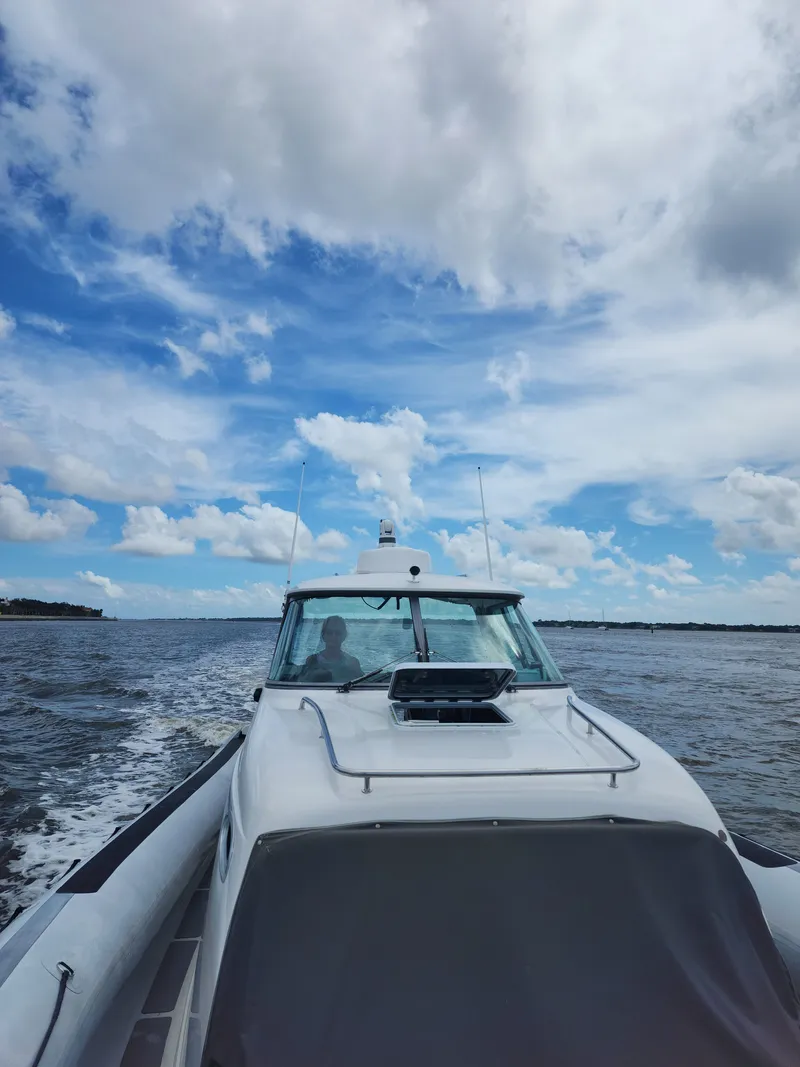 Slide: The Image of Protector 410 Targa 2008 on open sea under blue sky. - 1