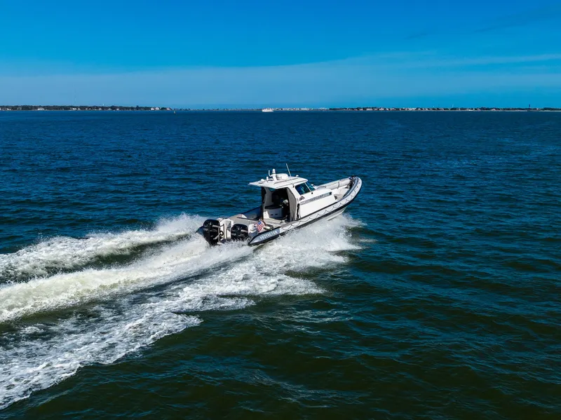 Slide: The Image of Protector 410 Targa 2008 cruising swiftly on open sea. - 18