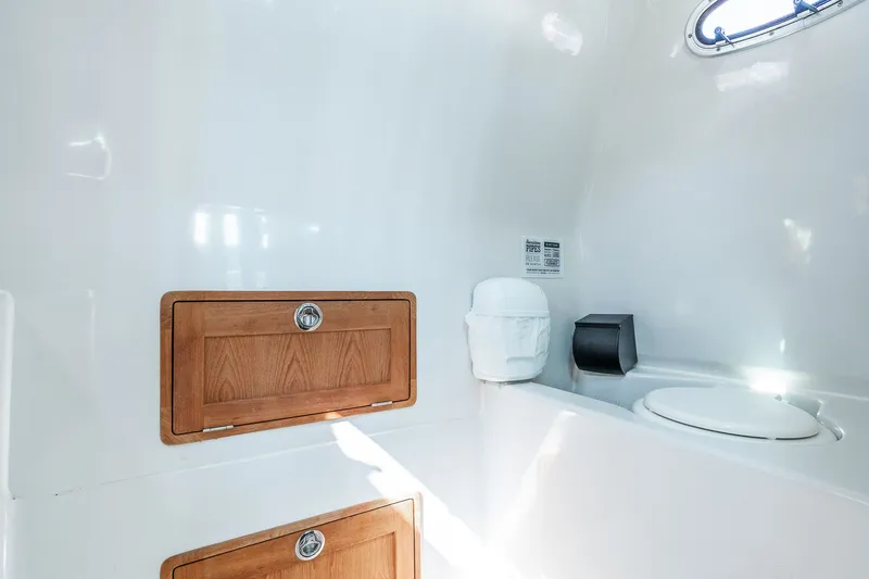 Slide: The Image of Interior of 2008 Protector 410 Targa with wooden cabinets. - 23