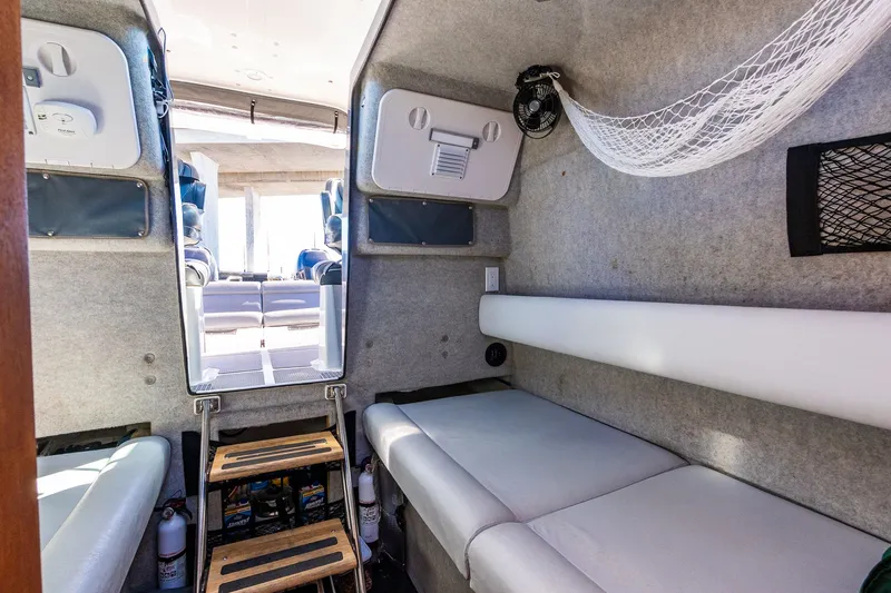 Slide: The Image of Interior of 2008 Protector 410 Targa boat with seating area. - 27