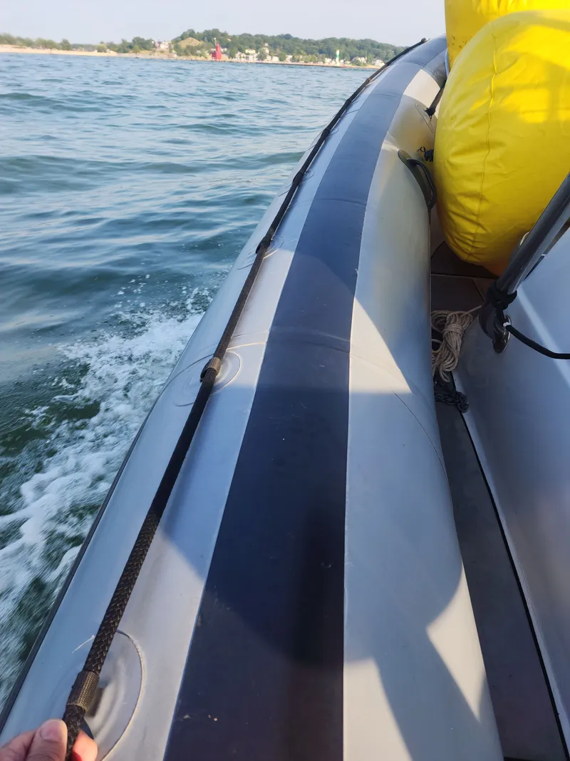 Slide: The Image of Protector 410 Targa 2008 on water with yellow buoys. - 3