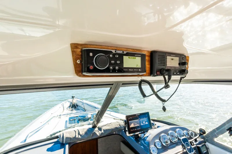 Slide: The Image of Interior view of a 2008 Protector 410 Targa boat with electronics. - 45
