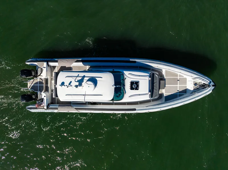 Slide: The Image of Aerial view of a 2008 Protector 410 Targa boat on the water. - 8