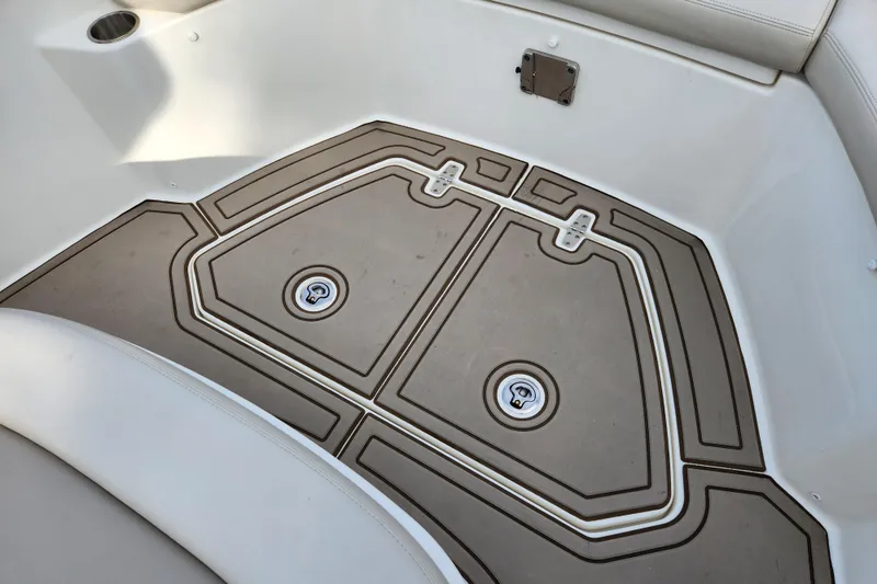 Slide: The Image of 2022 Boston Whaler 330 Outrage boat deck with storage compartments. - 28