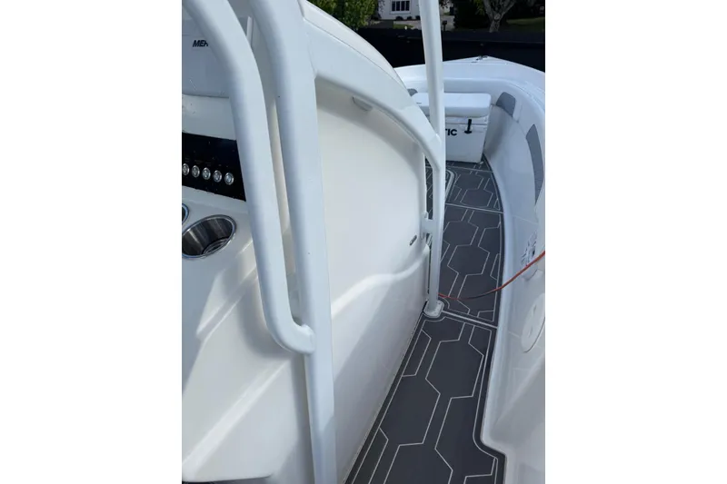 Slide: The Image of 2018 Carrera Powerboats 23 interior with modern design and sleek flooring. - 2