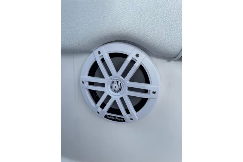 Slide: The Image of White Rockford Fosgate speaker on 2018 Carrera Powerboats 23 interior. - 6