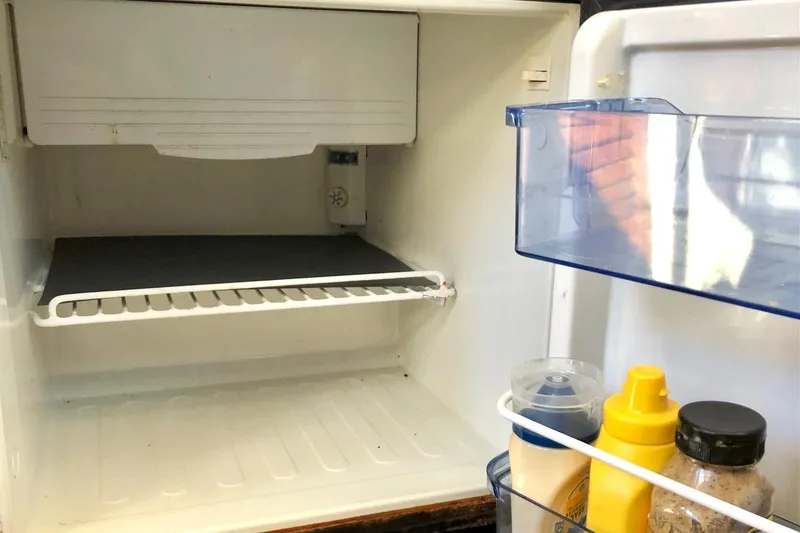 Slide: The Image of Digital thermostat displaying room temperature of 57 degrees on Osprey 30 Fisherman, 2017 model. - 16