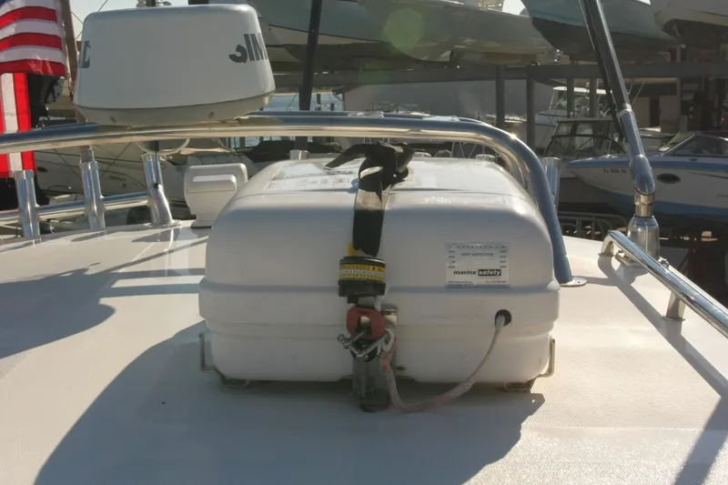 Slide: The Image of 2017 Osprey 30 Fisherman boat docked, featuring fishing gear and sleek design. - 29