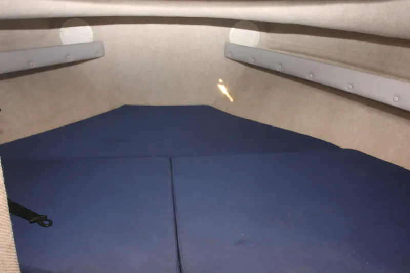 Slide: The Image of 2017 Osprey 30 Fisherman boat docked, featuring dual engines and American flag. - 31