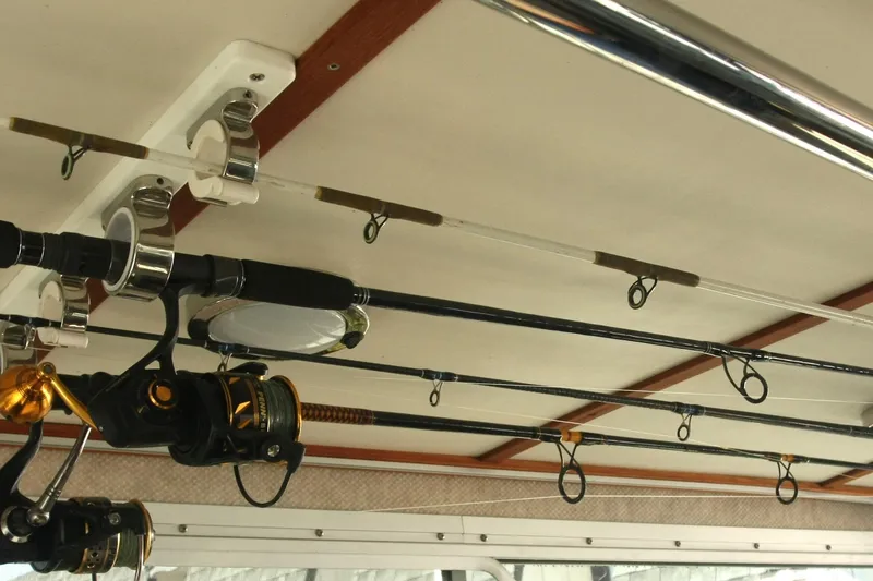 Slide: The Image of 2017 Osprey 30 Fisherman boat deck with safety equipment and radar. - 32