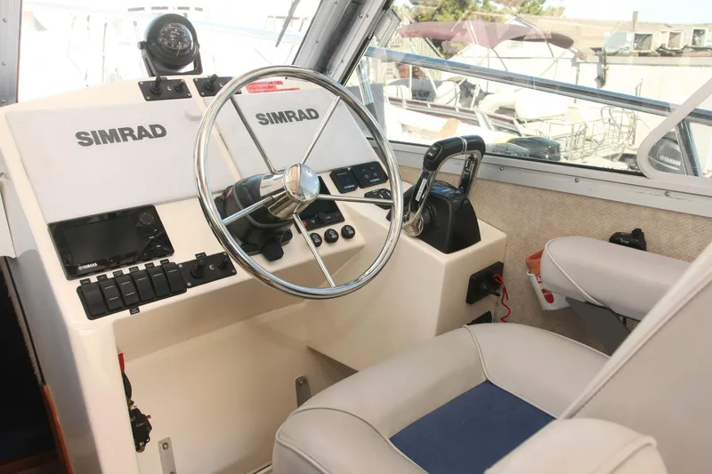 Slide: The Image of Interior of 2017 Osprey 30 Fisherman boat with Simrad navigation system. - 4