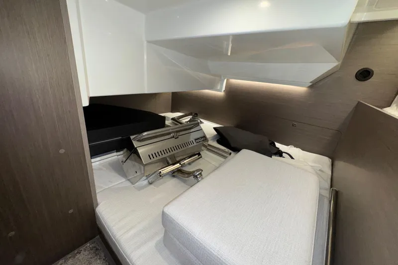 Slide: The Image of 2025 Jeanneau NC 895 Sport Series 2 cabin interior with modern design elements. - 11