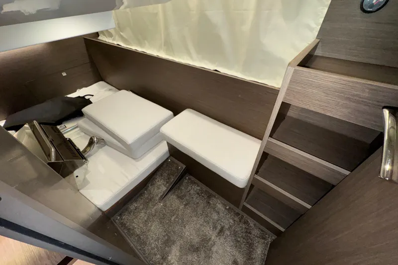 Slide: The Image of 2025 Jeanneau NC 895 Sport Series 2 cabin interior with modern design and compact layout. - 13