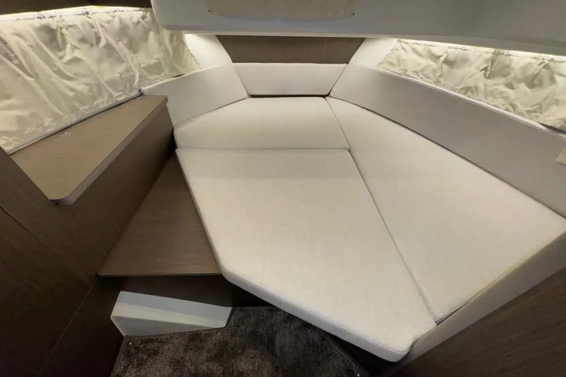 Slide: The Image of Interior cabin of 2025 Jeanneau NC 895 Sport Series 2, featuring a cozy bed. - 15