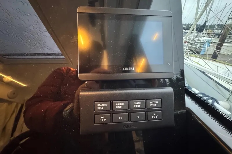 Slide: The Image of Control panel of a 2025 Jeanneau NC 895 Sport Series 2 boat with Yamaha display. - 23
