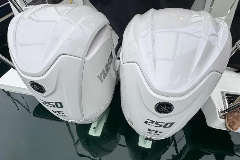 Slide: The Image of Twin Yamaha 250 V6 outboard engines on a 2025 Jeanneau NC 895 Sport Series 2 boat. - 49