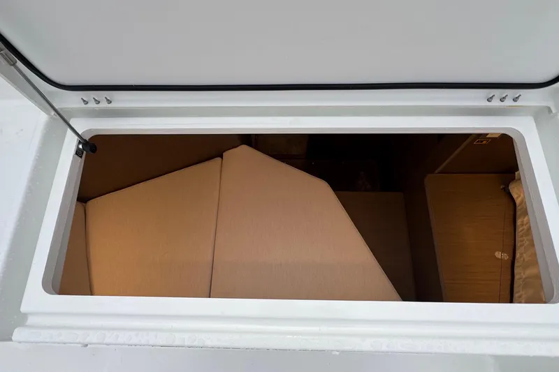 Slide: The Image of 2025 Jeanneau NC 895 Sport Series 2 cabin interior view through hatch. - 59