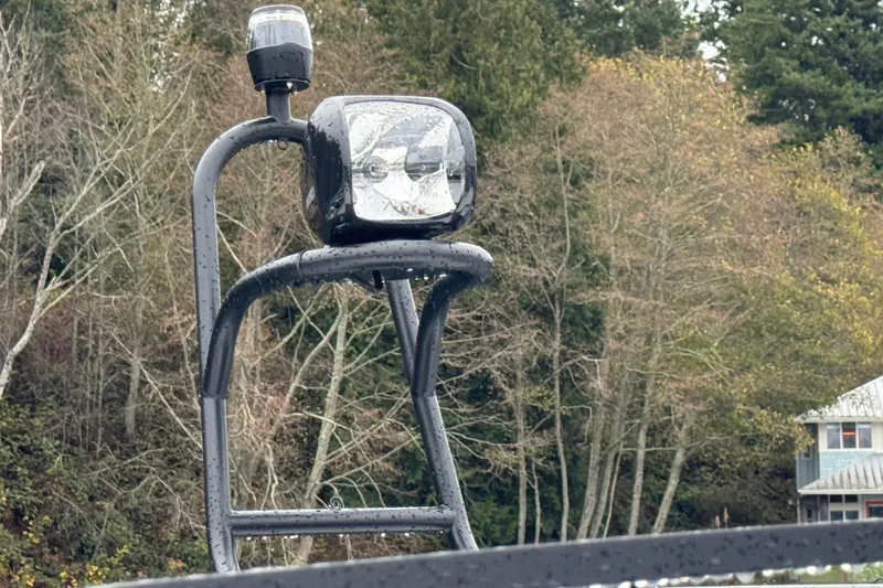 Slide: The Image of Rooftop light fixture on 2025 Jeanneau NC 895 Sport Series 2 boat, surrounded by trees. - 65