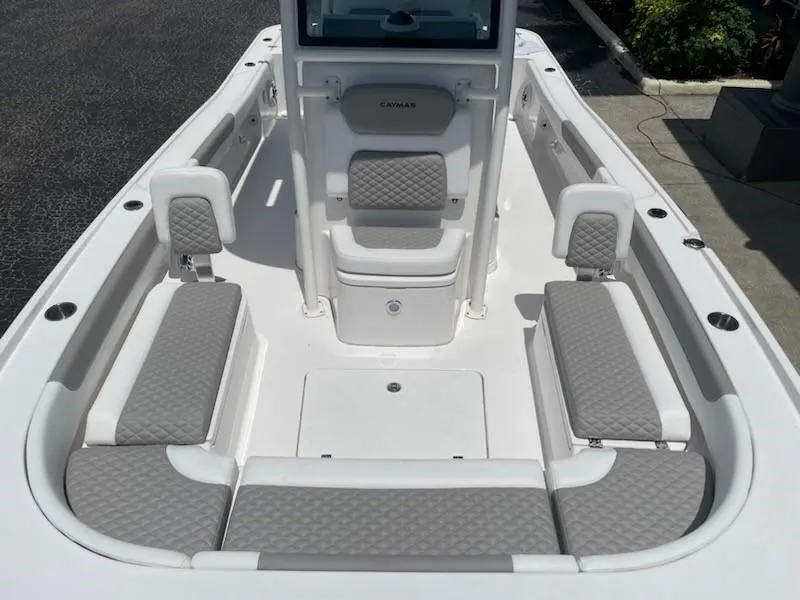 Slide: The Image of Interior of a 2023 Caymas 26 HB boat with gray upholstery. - 3