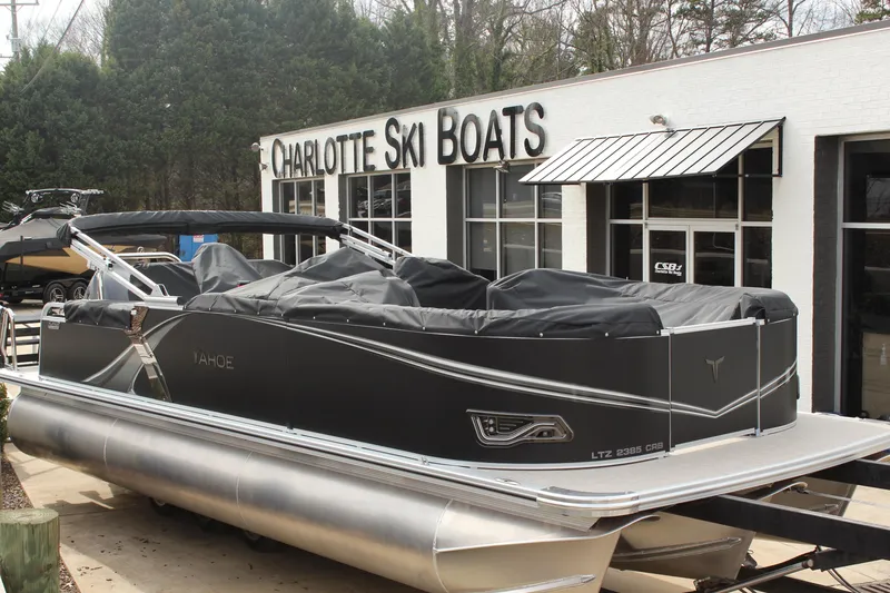 Slide: The Image of 2026 Tahoe Pontoon LTZ boat at Charlotte Ski Boats dealership. - 0