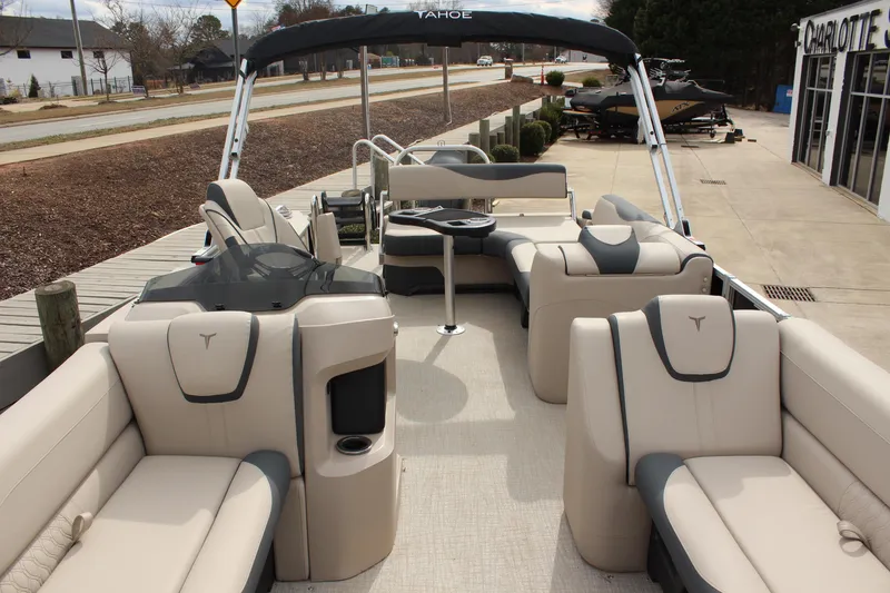 Slide: The Image of 2026 Tahoe Pontoon LTZ boat interior with luxurious seating and modern design. - 16