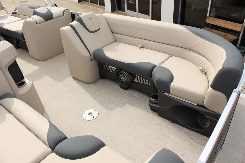 Slide: The Image of 2026 Tahoe Pontoon LTZ interior with beige and gray seating, showcasing luxury and comfort. - 18