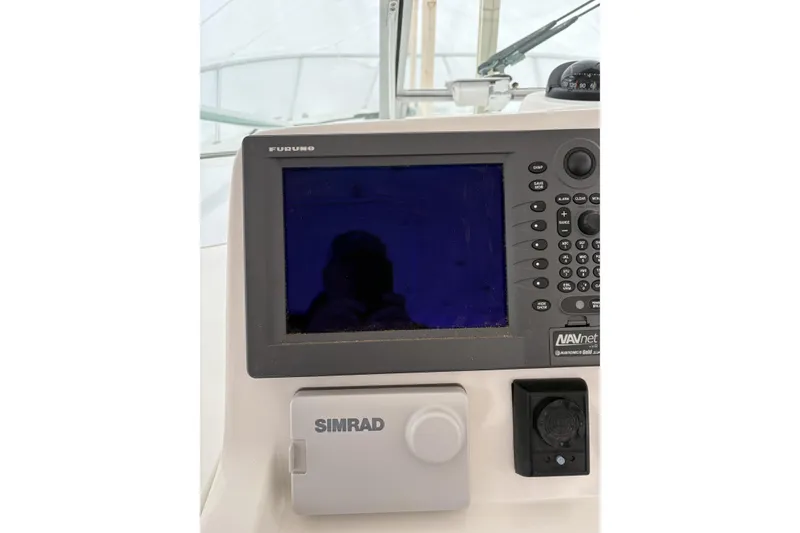 Slide: The Image of Close-up of a 2006 Rampage 38 Express boat control panel display. - 10