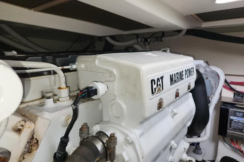 Slide: The Image of Engine compartment of 2006 Rampage 38 Express with CAT Marine Power engine. - 30