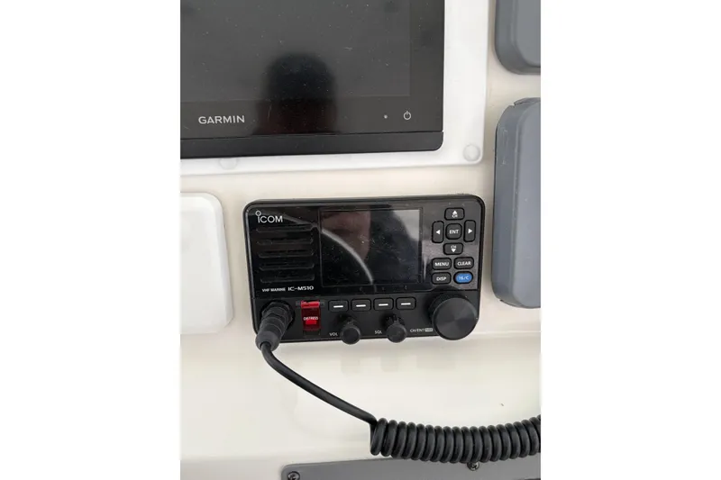 Slide: The Image of Control panel of a 2006 Rampage 38 Express boat with navigation equipment. - 7