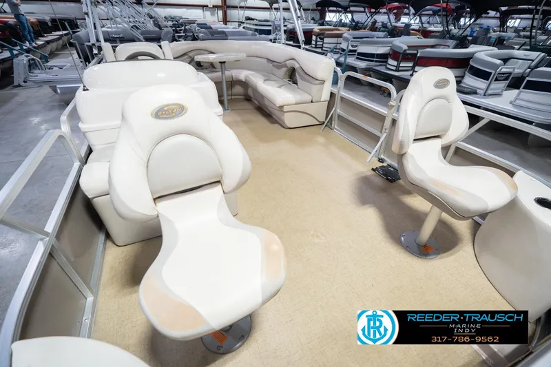 Slide: The Image of Interior of 2009 Sylvan 818 Mirage Fish pontoon boat with seating and helm. - 13